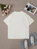 Back flat lay of plain white boxy T-shirt styled with jeans sneakers and sunglasses