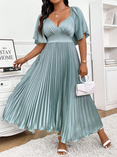 Chic Elegance: Plus Size Pleated Midi Dress with Deep V-Neck and Ruched Sleeves