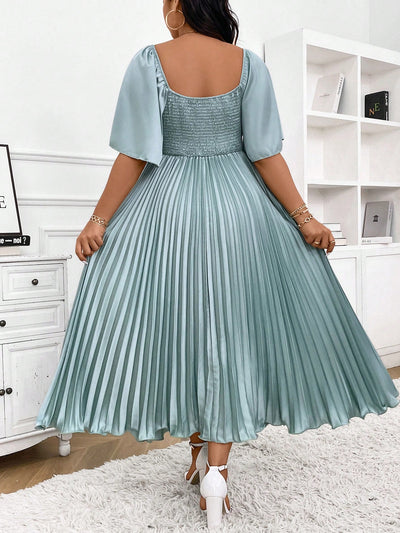 Chic Elegance: Plus Size Pleated Midi Dress with Deep V-Neck and Ruched Sleeves