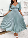 Chic Elegance: Plus Size Pleated Midi Dress with Deep V-Neck and Ruched Sleeves