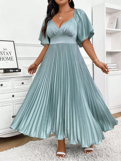 Chic Elegance: Plus Size Pleated Midi Dress with Deep V-Neck and Ruched Sleeves