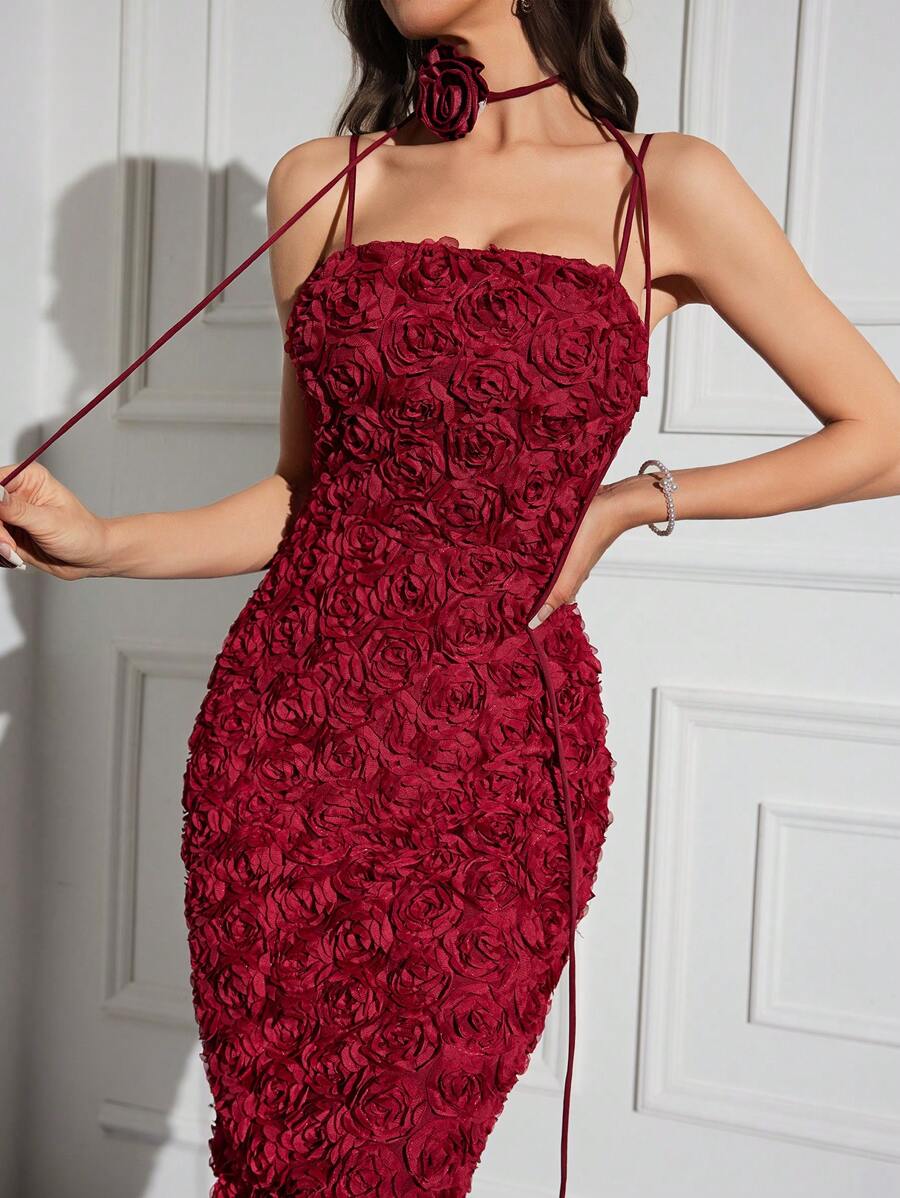 Step into the spotlight with this playful burgundy red cami dress, featuring charming tie shoulders that add a flirty touch. Its flowing long design makes it perfect for turning heads at any special occasion. Feel confident and effortlessly chic as you dance the night away in a dress made to celebrate you.