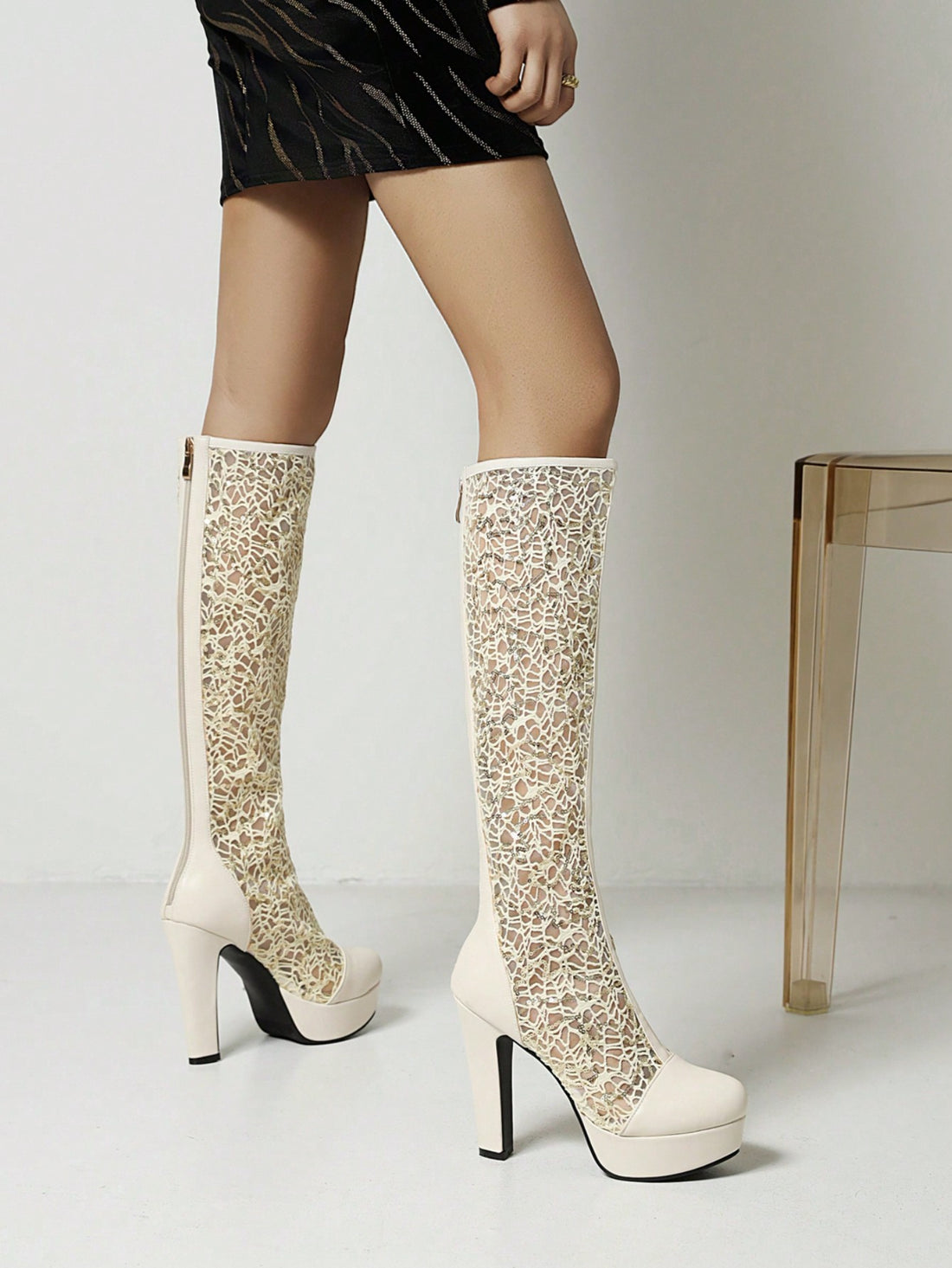 Stay comfortable and stylish this summer with our new Mesh Over-The-Knee Boots for petite women. Made with breathable material, these boots will keep your feet cool and dry while walking. Perfect for petite women who want to stay fashionable without sacrificing comfort.