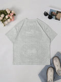 Back flat lay of plain heather grey short-sleeve T-shirt styled with jeans