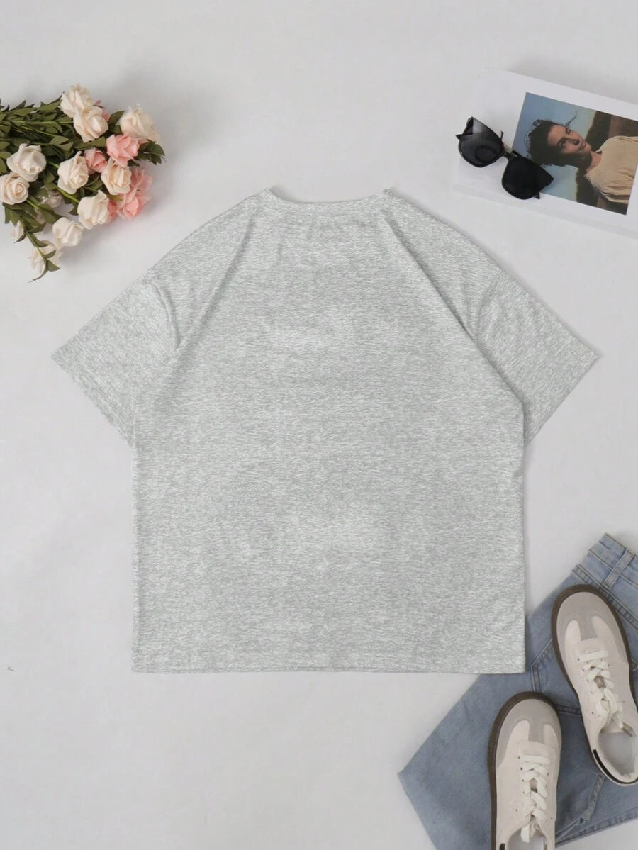 Back flat lay of plain heather grey short-sleeve T-shirt styled with jeans