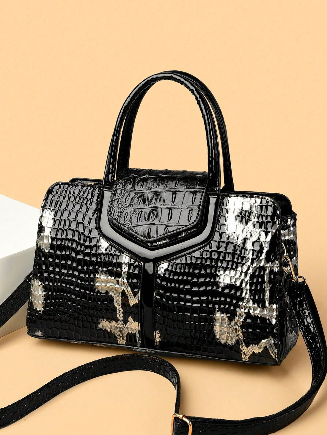 This vintage handbag is the perfect way to add a touch of retro-chic to any outfit. With a unique alligator snake pattern, it's sure to turn heads. Made for women, it's the ultimate accessory for those looking to make a statement. Expertly crafted, this handbag is a must-have for any fashion-forward individual.