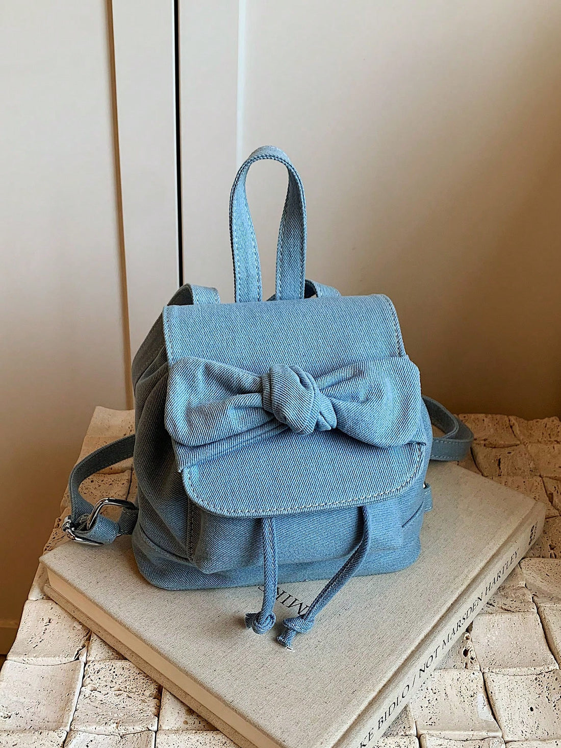 This Chic Bowknot Backpack is the perfect gift for any fashionable woman. With its elegant bowknot design and spacious interior, it's both stylish and practical. Surprise your date with this trendy accessory, perfect for any occasion. A must-have for any fashion-forward woman.