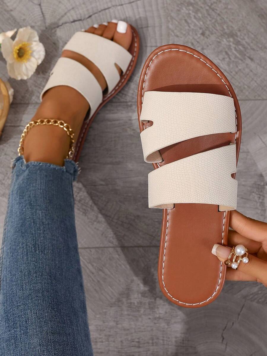 Step into summer with these stylish women's casual strap slide sandals! Designed for comfort and ease, these flat slip-ons are perfect for beach days or casual outings. The simple strap keeps your feet secure while letting you breeze through your day with effortless style. Lightweight and fun, they’re your go-to slippers for sunny adventures.