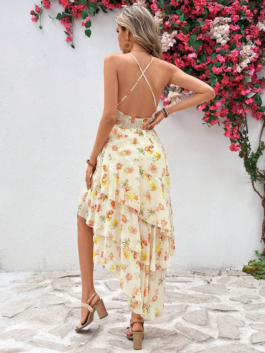 Get ready to rock effortless summer style with this casual halter dress! The playful print adds a fun twist to your look, while the halter neckline keeps you cool and comfortable. Perfect for any casual occasion, this dress will have you feeling fun and fabulous all season long. (No effort required!)