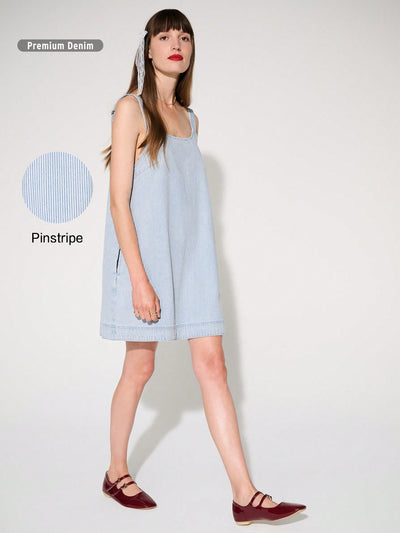 Experience effortless style and comfort this summer with our Non-Stretch Denim Tank Mini Dress! Made from high-quality, non-stretch denim, this dress is perfect for hot days and can be dressed up or down for any occasion. Stay chic while staying cool in this versatile and stylish piece.