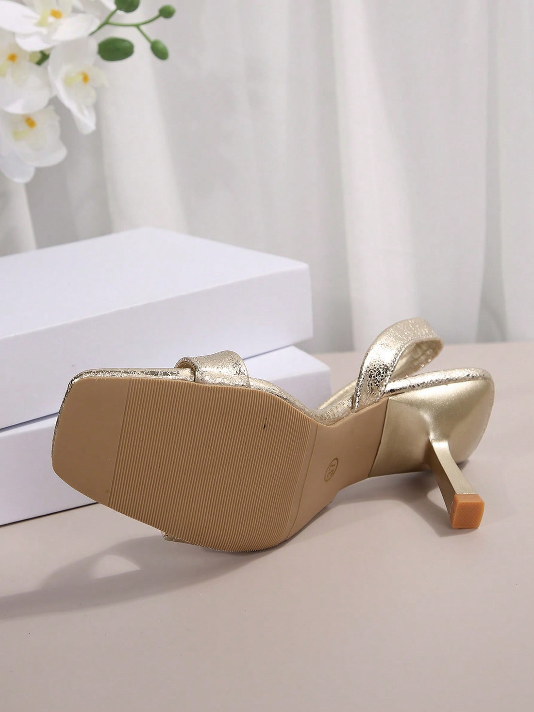 Step into summer with these show-stopping high heel sandals that prove comfort and style aren't mutually exclusive. Featuring a sleek silhouette and supportive sole, they're perfect for everything from weekend brunch to evening strolls. The elevated heel adds instant polish to any outfit while the breathable design keeps your feet happy all day long. Whether you're exploring the city or heading to an outdoor gathering, these versatile sandals deliver that effortless chic vibe you've been craving. Dress them