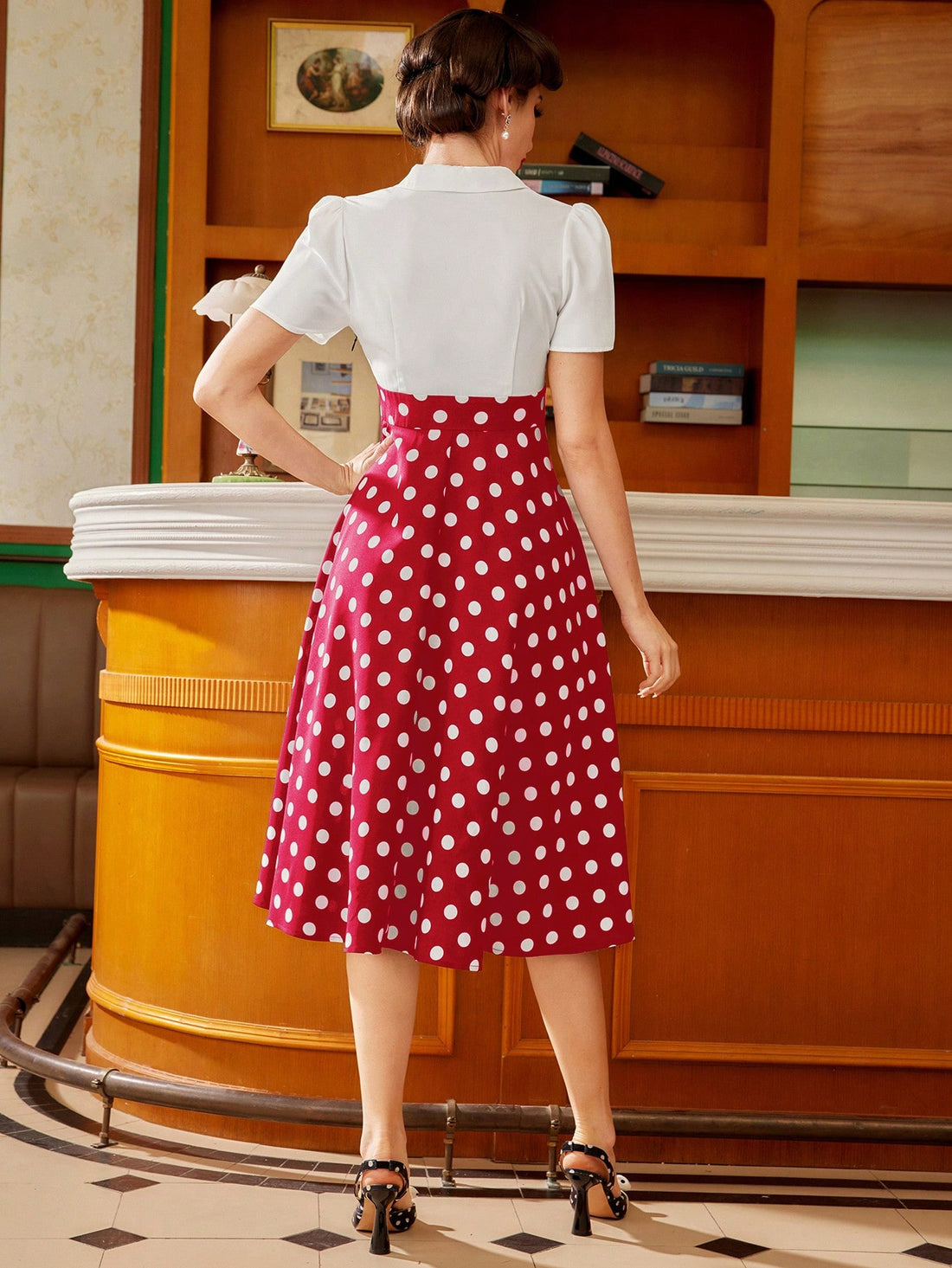 Look stunning at any spring or summer wedding or event with our Vintage-Inspired Elegant Polka Dot Swing Dress. Its classic design and polka dot pattern will add a touch of elegance to your look. Made for modern women with a love for vintage fashion.