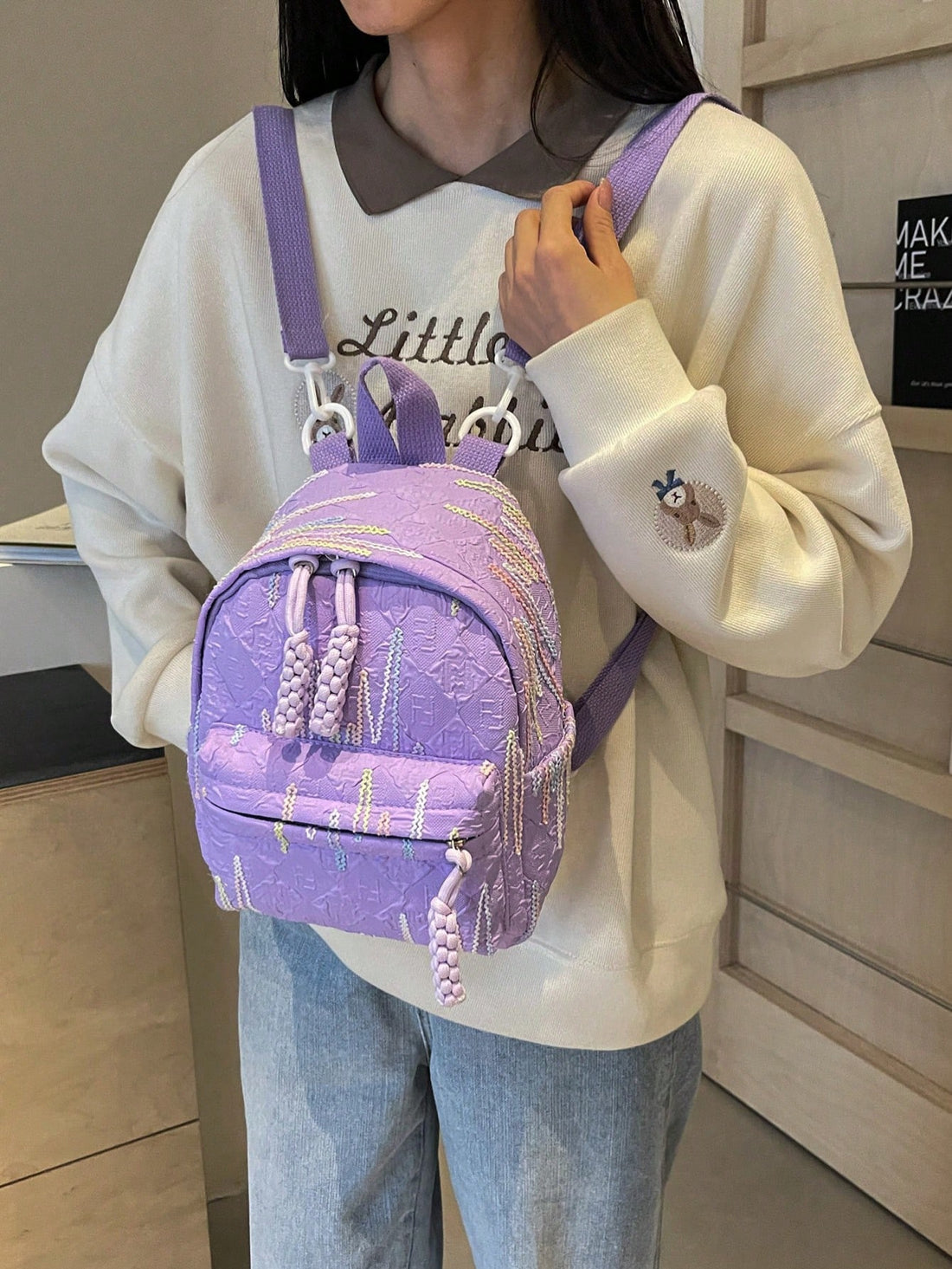 This Stylish Striped Nylon Backpack is the perfect accessory for shopping, travel, and casual outings. It's made from durable nylon and features a trendy striped design, making it both fashionable and functional. Stay organized with its multiple compartments and travel with ease thanks to its lightweight construction.