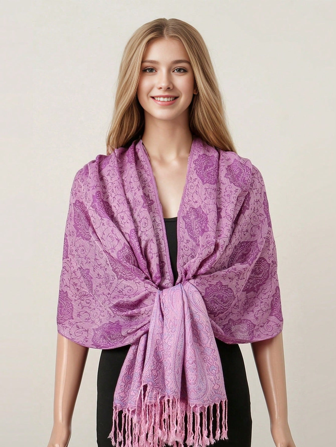 Indulge in ultimate luxury with our cashmere scarf. Elevate your winter style with our collection of jacquard wraps and ponchos, featuring intricate patterns and bold colors. Experience the softness and warmth of cashmere while making a statement. Upgrade your winter wardrobe now.
