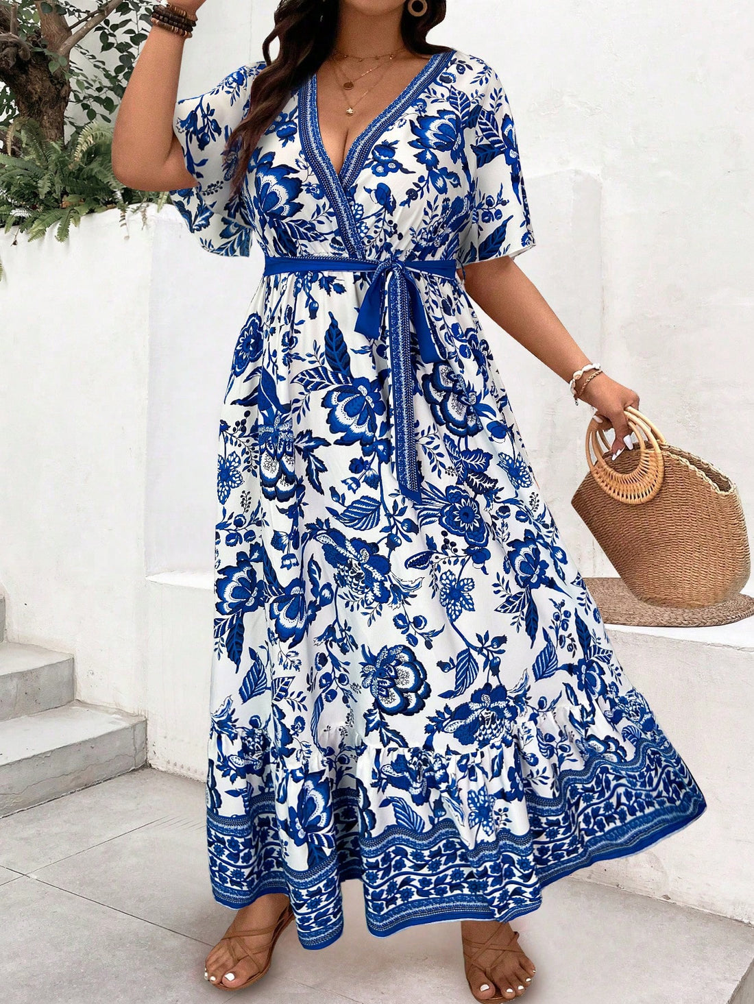 Sway into vacation mode with this eye-catching plus size midi dress! Featuring a vibrant abstract art print inspired by tropical paradises, this dress combines comfort with head-turning style. The playful ruffle hem adds just the right amount of flirty movement whether you're sipping cocktails beachside or dancing under the stars. Your holiday wardrobe just got a fabulous upgrade!