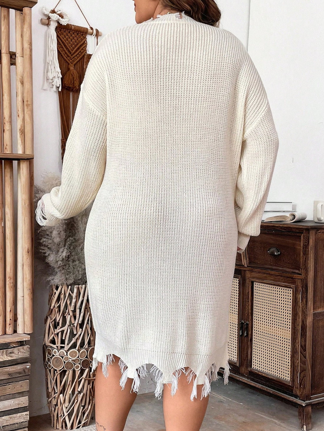 Step into effortless style with this Chic Plus Size Distressed Sweater Dress, designed to bring comfy cool vibes to your spring and autumn wardrobe. Its playful distressed details add just the right touch of edge, while the cozy knit keeps you warm without weighing you down. Whether you're out for brunch or lounging with friends, this dress blends comfort and fashion in perfect harmony. Embrace the season with a piece that’s as fun as it is flattering.