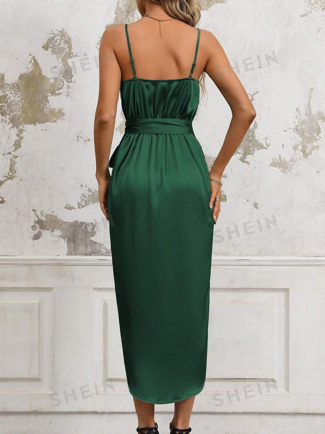 Effortlessly elevate your everyday wardrobe with our Solid Color Spaghetti Strap Dress. Made for comfort and elegance, our dress features adjustable straps and a flattering silhouette. Perfect for any occasion, this dress will be your go-to for effortless style and chic simplicity.