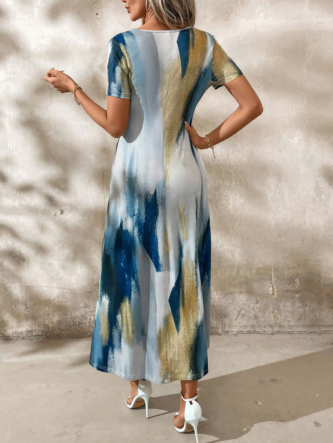 Get ready to turn heads and make a statement with our Chic Abstract Tie-Dye Long Knit Dress with Pockets. This dress is the perfect blend of fashion and function, featuring a unique tie-dye pattern and convenient pockets for all your essentials. Say goodbye to boring dresses and hello to a bold and stylish look.