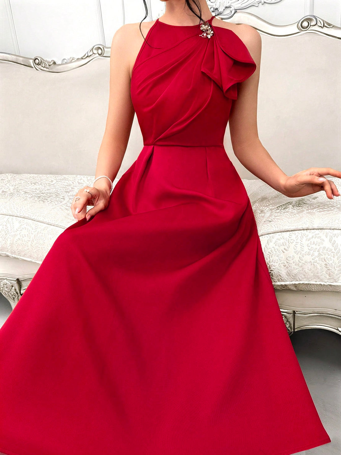 This sleeveless summer maxi dress boasts an elegant design featuring a ruffle hem and pleated detailing. With its chic and stylish appearance, this dress is perfect for any summer event, providing both comfort and sophistication. Let this dress make a statement for you with its beautiful and timeless design.