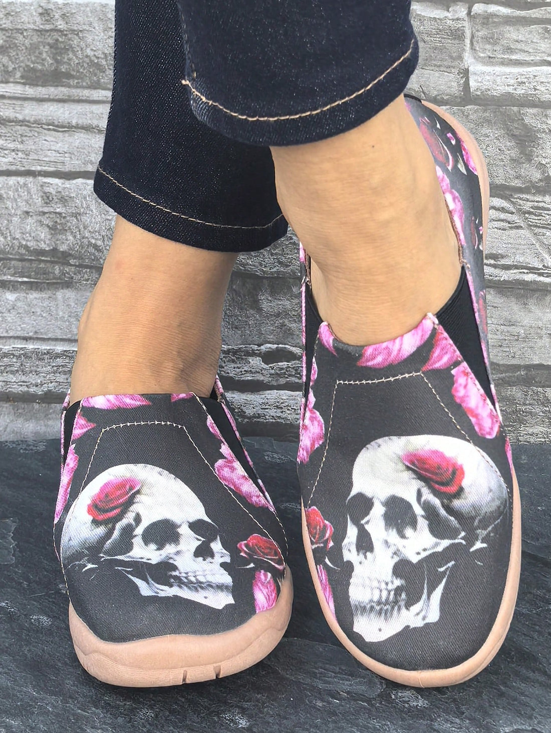 Elevate your Halloween style with these Skull & Red Rose Print Casual Sneakers! Featuring a comfortable lace-up design, these loafers are perfect for women on the go. The spooky print adds a unique touch to any outfit, making these shoes both stylish and practical.
