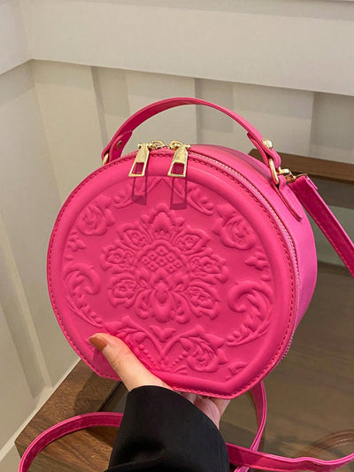 Vintage Flower Embossed Round Handbag: The Chic Commuter's Essential