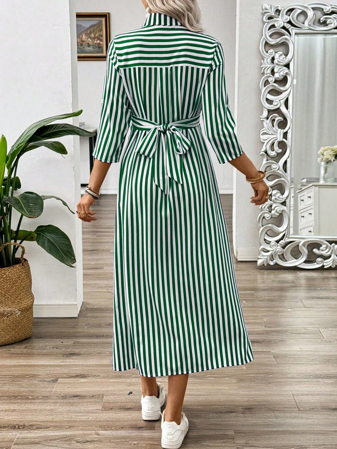Get ready to turn heads in this chic summer maxi dress with a playful French twist front and buckle detail. With its trendy striped design, you'll be sure to stand out at any summer event. Perfect for any fashion-forward individual looking for a unique and stylish addition to their wardrobe!