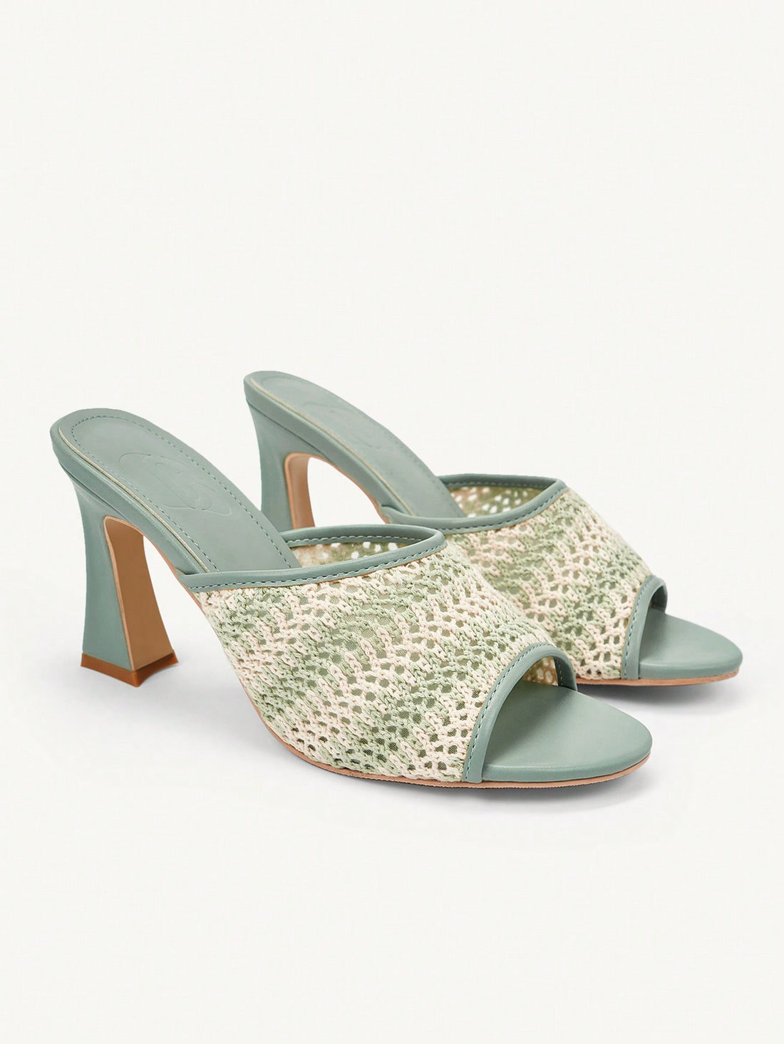 Elevate your Halloween look with Wickedly Chic's Chunky Heel Sandals. Designed for the fashion-forward woman, these sandals boast a bold, chunky heel for added height and comfort. Perfect for all-day wear, complete your costume or elevate your everyday style with these must-have sandals.