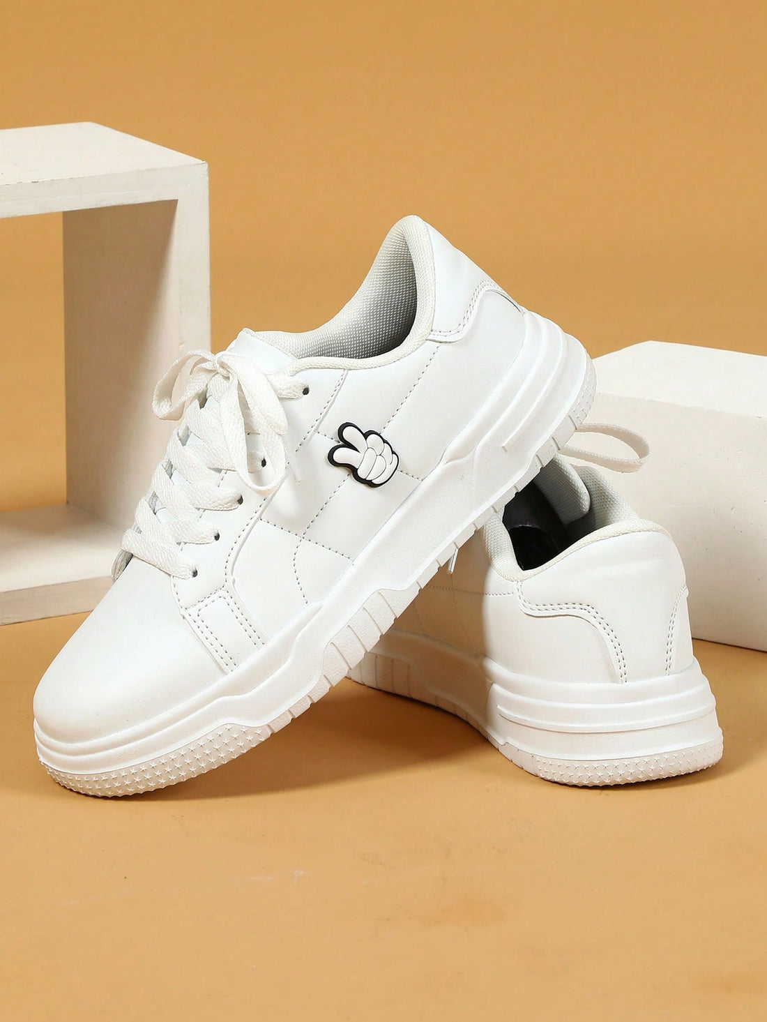 Upgrade your shoe game with our Versatile White Sneakers. They are perfect for any occasion, from festive parties to street walking and daily wear. Made with quality materials, these sleek sneakers will elevate any outfit while providing ultimate comfort. Available now.