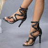 Step Out in Style with Women's Snake Skin Stiletto Gladiator Sandal Boots