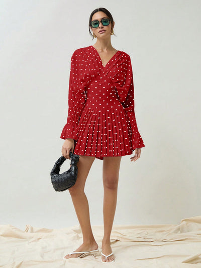 This stylish and elegant Women's V-Neck Dress features a classic polka dot pattern and flattering pleats. Made with high-quality materials, it's timeless and versatile, perfect for any occasion. The chic design and comfortable fit make it a must-have addition to any wardrobe.