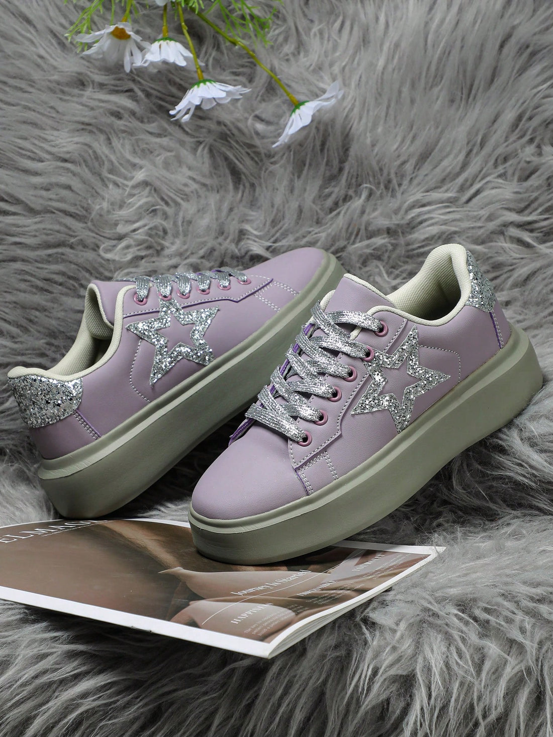 Elevate your street style with our Shimmering Star Couple Sneakers. The eye-catching purple and silver design features a unique star pattern that adds a touch of glam to any outfit. Designed for women, these sneakers bring a touch of shimmer and a whole lot of style to your wardrobe.