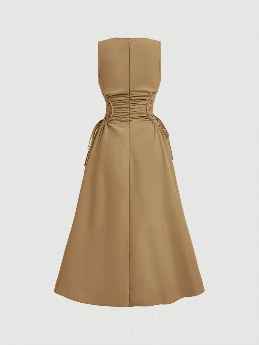 Back view of camel tan fit and flare midi dress with full skirt