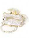 Chic Romance: Elegant Satin Bowknot Pearls Clutch Bag for Special Occasions