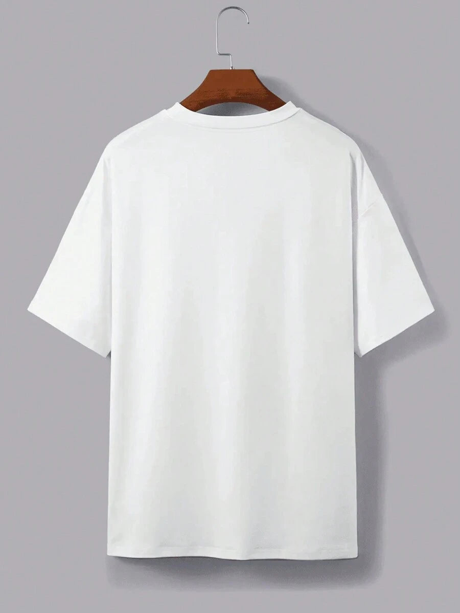Close front view of white oversized Seaside Seafood graphic tee with red blue fish slogan print