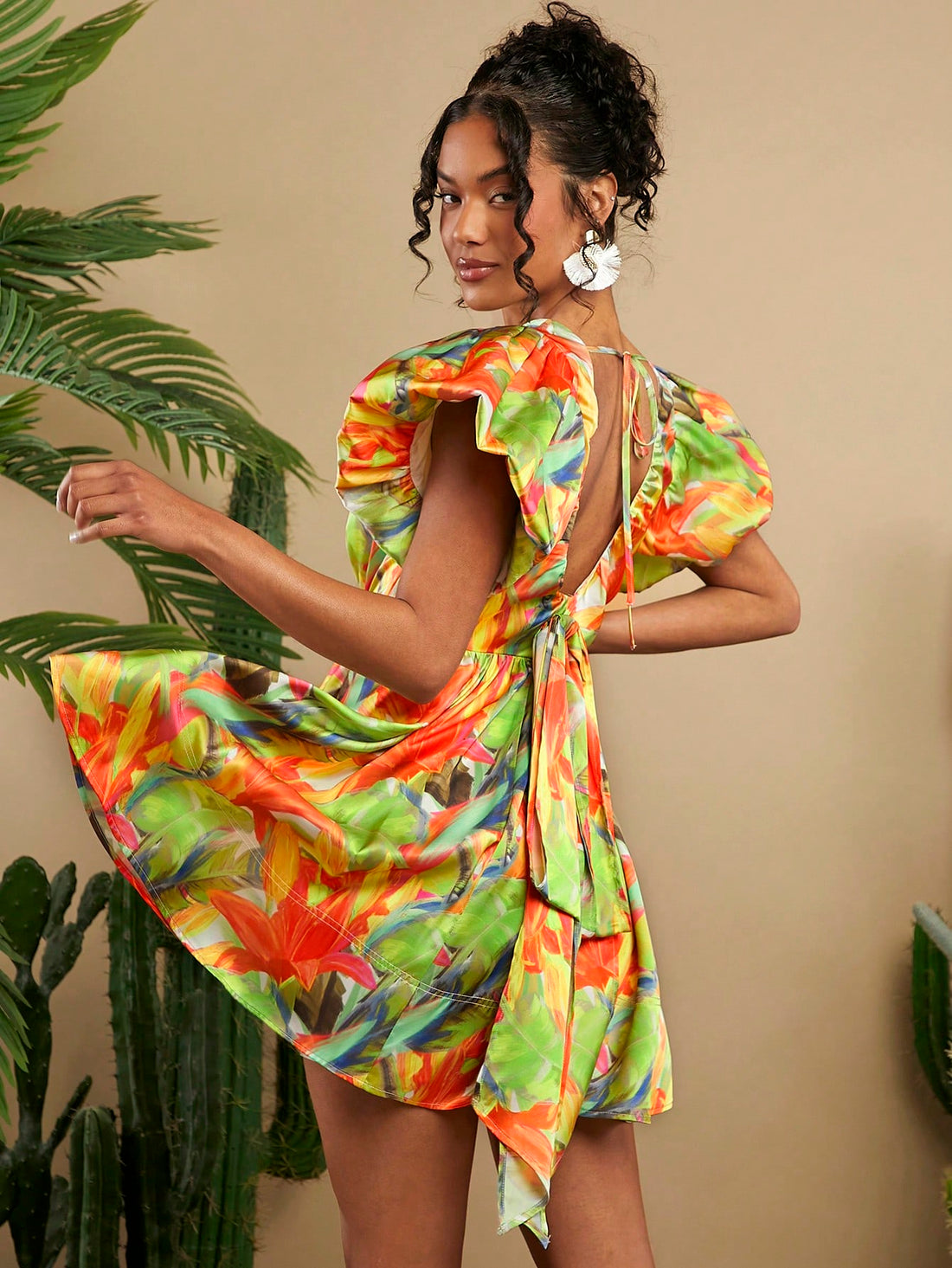 Step into sunshine with this Chic Tropical Flower Ruffle Hem Mini Dress! Its vibrant floral print and flirty ruffle hem bring playful charm to your summer wardrobe. Lightweight and breezy, it’s perfect for beach days, garden parties, or casual strolls. Effortless style meets fun flair in this must-have dress that keeps you cool and radiant all season long.