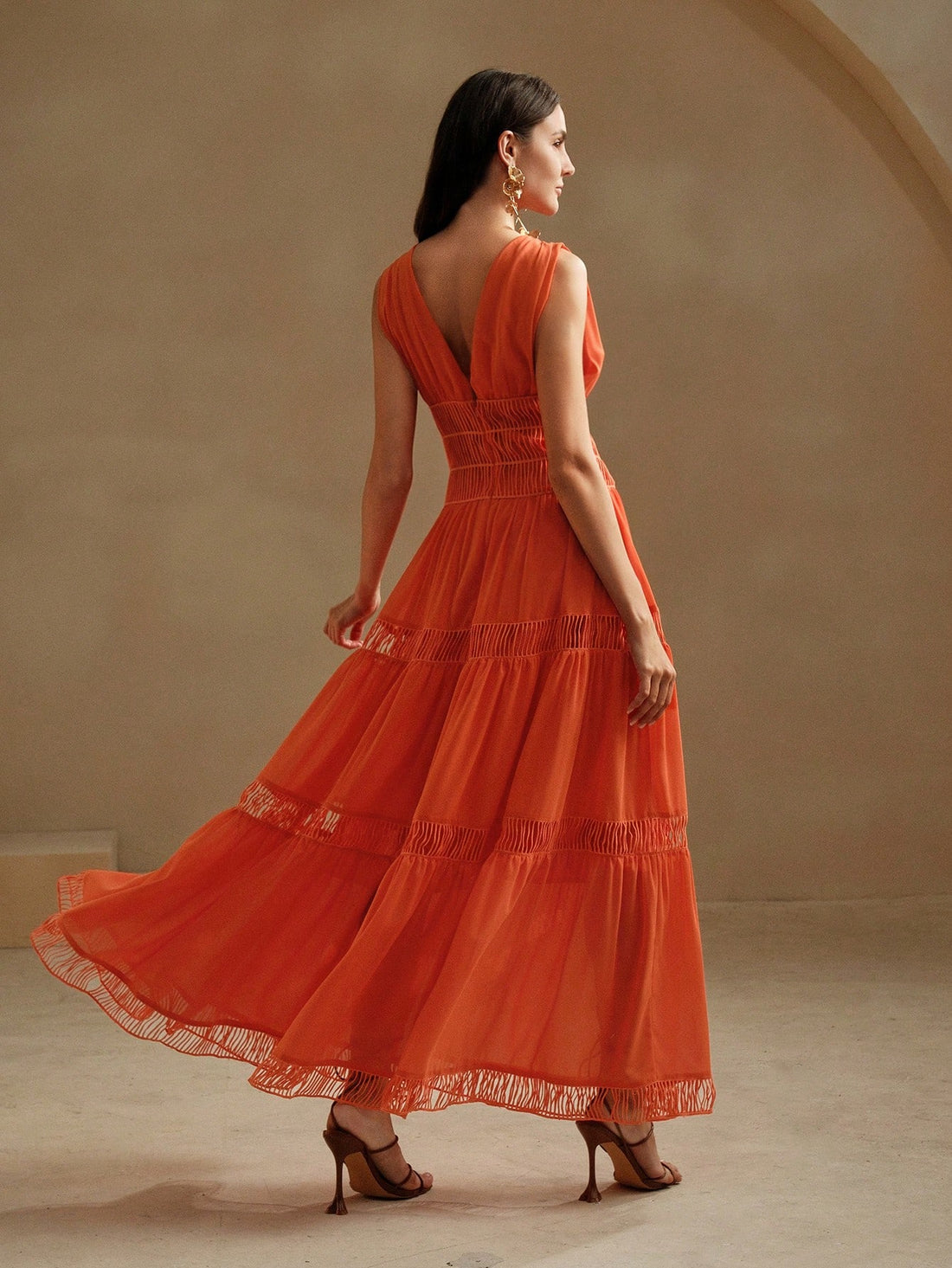 This elegant white dress is perfect for your next cocktail party. With a deep v-neck and made of chiffon, it exudes effortless sophistication. Crafted specifically for women, it is designed for a flattering swing silhouette. Be ready to make a stylish entrance and turn heads with this must-have dress.