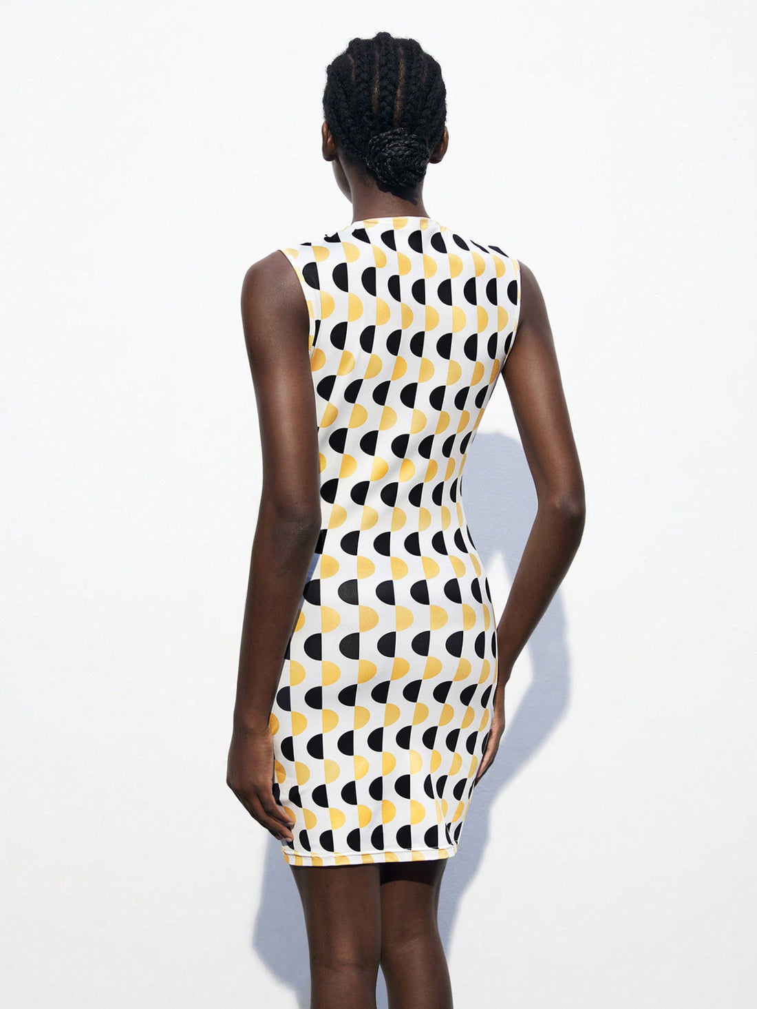 Introduce modern elegance to your wardrobe with our Chic Geometric Print Bodycon Mini Dress. With its stunning geometric print design, this dress is both visually striking and expertly crafted to flatter your figure. Transform any occasion into a stylish affair with this must-have dress.