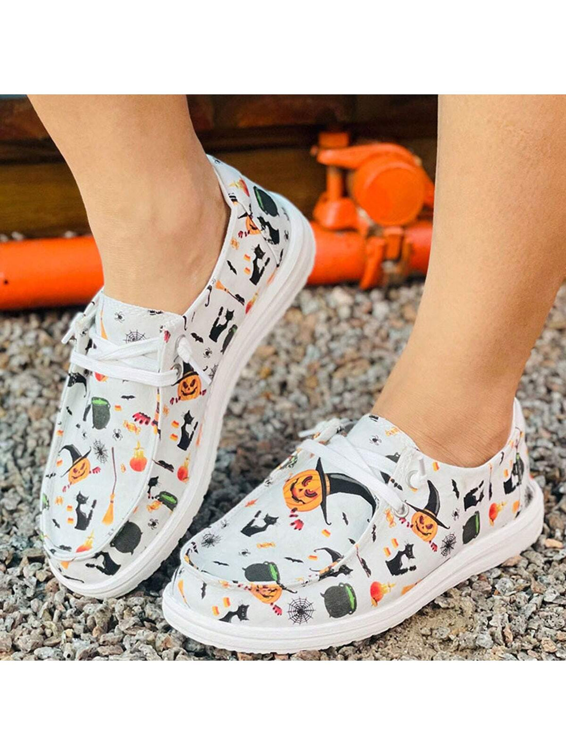 Step into spooky season with these Trendy Women's Halloween Canvas Shoes! Designed for comfort with soft soles and a flat profile, they keep your feet happy all day. The playful tie detail adds a stylish twist, making them perfect for casual outings or festive fun. Embrace Halloween vibes while staying effortlessly chic and comfy.