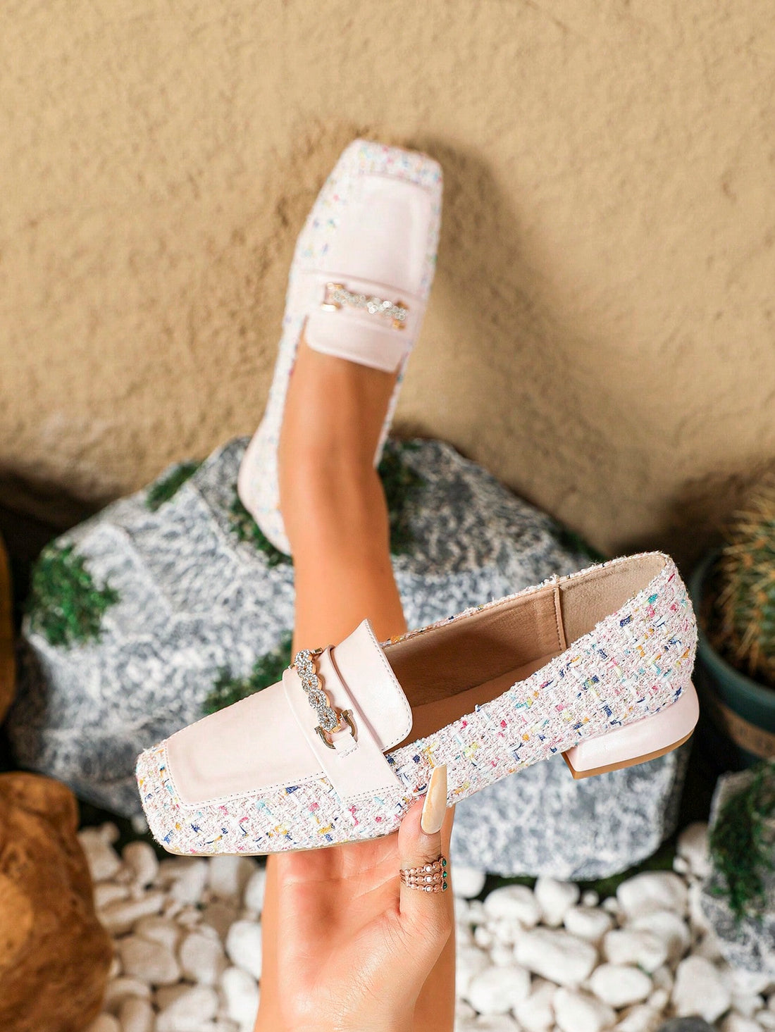 Step up your everyday footwear with our chic and stylish flats. Featuring metal decorations, these flats will elevate any look from casual to elegant. With a sleek design and comfortable fit, these flats are a must-have for any fashion-forward woman.