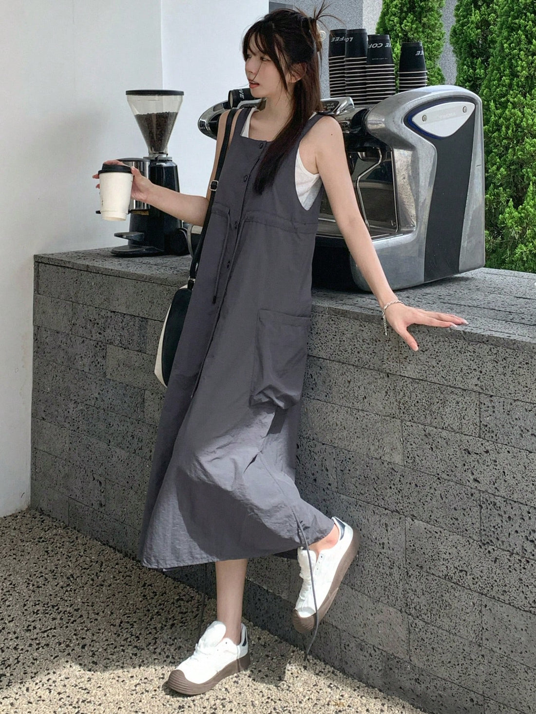 Achieve effortless summer style with this women's strappy solid color overall dress. Button details add a touch of charm while convenient side pockets offer functionality. Perfect for a casual day out or a fun event. (No more boring dresses!)