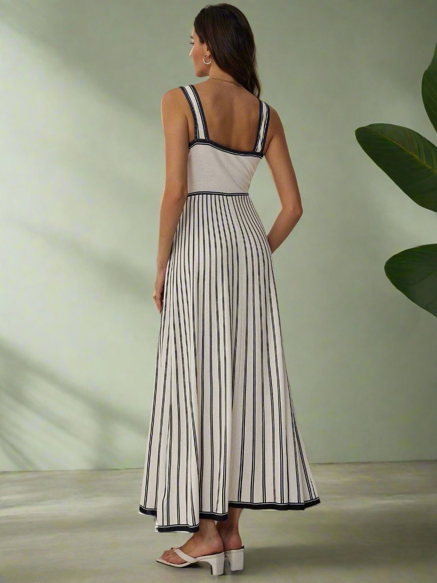 Effortlessly transition from work to dates to summer outings with our Chic & Elegant Color Block Striped Long Slip Dress. The perfect combination of style and versatility, this dress will elevate your wardrobe. Make a statement with its bold stripes and feel comfortable all day with its slip design.