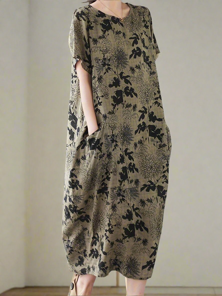 Effortlessly express your sense of togetherness with our Random Printed Mid-Length Dress. The vibrant prints add a touch of fun to your style while the mid-length design provides a comfortable yet stylish fit. Stand out and show your unity in style.