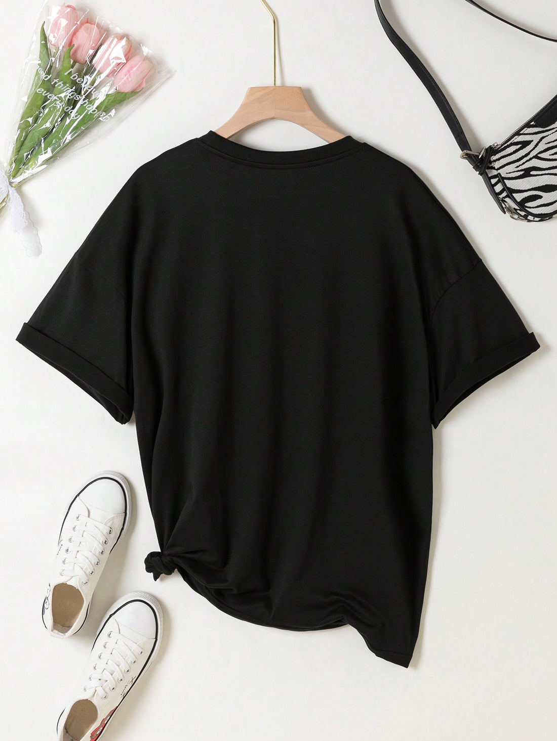 Stay cool and stylish this summer with our Trendy Summer Tee! This casual short sleeve shirt features a fun print of letters and drinks. Made with high-quality materials, it's perfect for any summer outing. Add a touch of fun to your wardrobe and stay comfortable all day long.