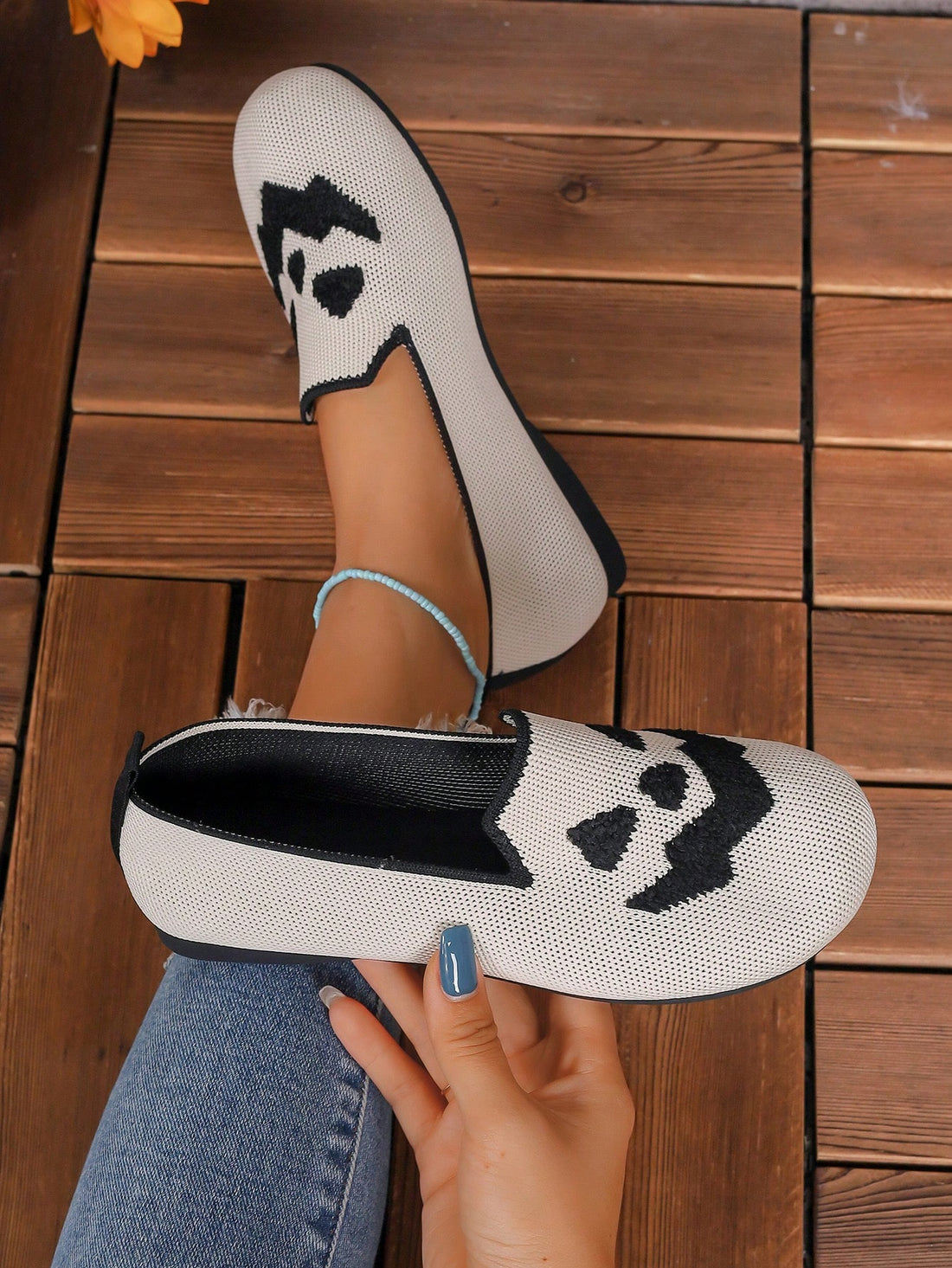 Add some spooky style to your Halloween outfit with these Pumpkin Spice and Everything Nice slip-on shoes. Featuring a festive pumpkin pattern, these shoes are perfect for any fall celebration. The comfortable slip-on design makes them easy to wear for all-day festivities.