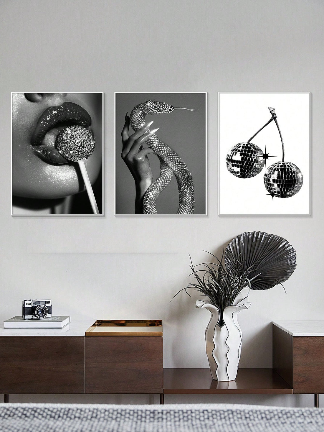 Add a touch of elegance to your home with our Chic and Stylish 3-Piece Black, White, and Gray Hanging Paintings Set. Perfect for modern home decor, these paintings feature a sleek design and monochromatic color palette. Create a sophisticated atmosphere and elevate your interior with this unique set.