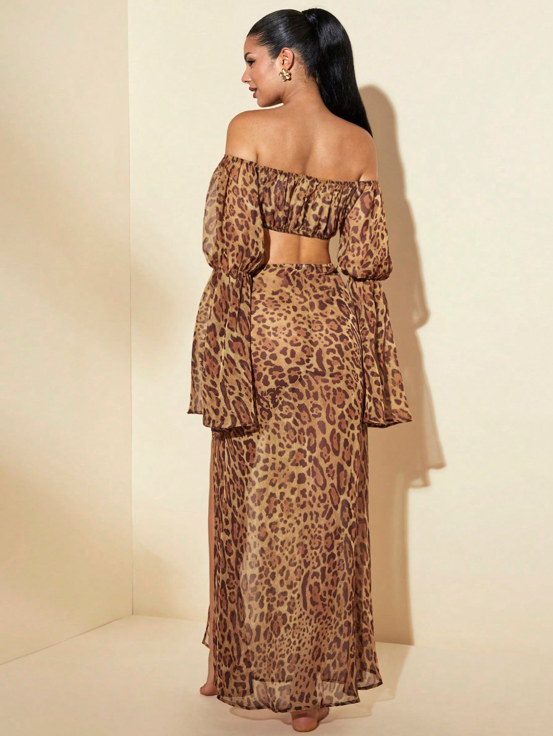 Make a splash this season with our stunning leopard print two-piece set! The open-shoulder crop top flaunts a chic, modern silhouette that's perfect for turning heads, while the flowing maxi skirt adds an effortless elegance to your beach or pool party look. The bold leopard pattern brings that wild, confident energy you've been craving. Mix and match with your favorite accessories, or wear it as a complete ensemble for an Instagram-worthy moment. Whether you're lounging poolside or dancing under the stars,