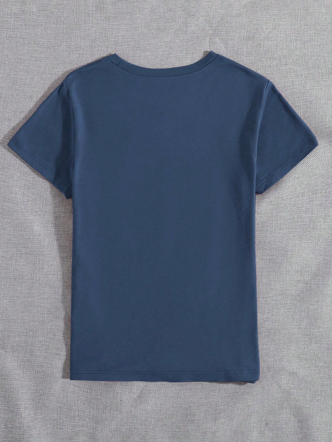 Add some bookish charm to your wardrobe with our Floral Book Print T-Shirt! Featuring a colorful book print on a soft, casual tee, this shirt is perfect for any book lover. The short sleeves make it perfect for warmer weather while the graphics add a touch of whimsy. (Bookworms unite!)