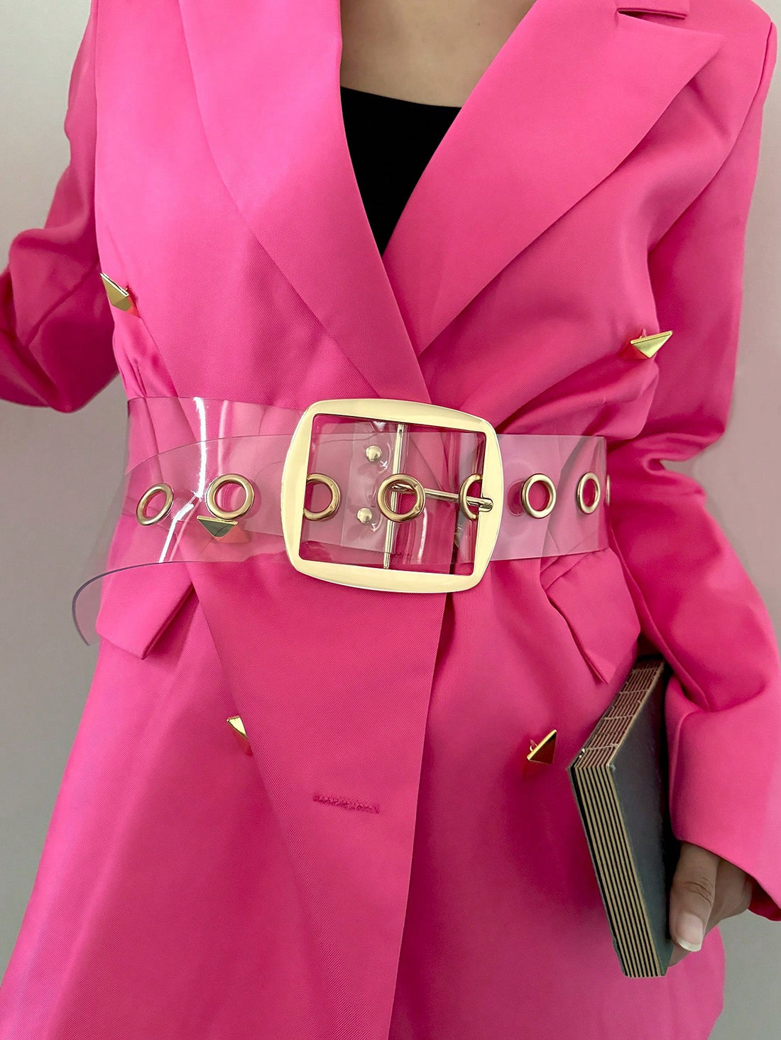 This chic transparent PVC wide belt is the perfect accessory for versatile styling options. It is ideal for completing your suit look, adding flair to dresses, or elevating your everyday wear. The transparent material adds a modern touch, making it a must-have for any fashion-forward individual.