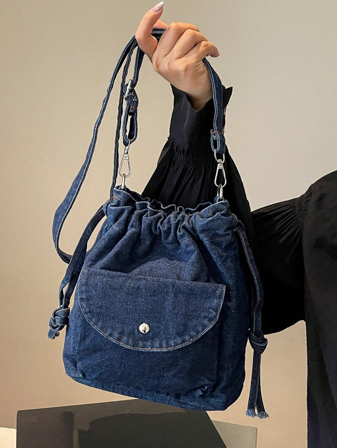 Expertly crafted in a vintage blue distressed canvas, this tote bag is both stylish and versatile. With a large capacity, it's perfect for everyday use. Plus, its durable design ensures long-term use. Make a statement with this functional and fashionable shoulder bag.