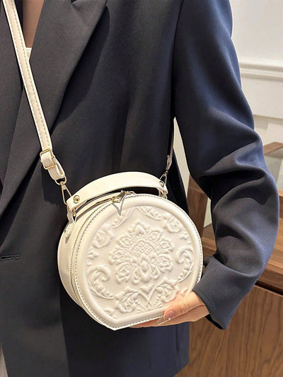 Vintage Flower Embossed Round Handbag: The Chic Commuter's Essential